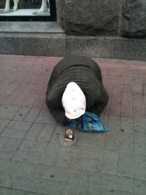 Ukrainian Woman Begging